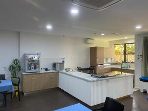 Cabinets for nursing home 
Timber and white combo in Boston oak and vivid white.
Bench top in quantum quartz fantastico.